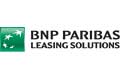 BNP Paribas Leasing Solutions Logo mit grünem Emblem und weißen Sternen neben dem Firmennamen in schwarzer Schrift.