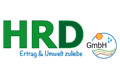 Logo der HRD GmbH mit grüner Schrift und blauem Text, mit einer Sonnen- und Feldgrafik auf der rechten Seite.