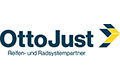 OttoJust-Logo mit einem blau-gelben Pfeil und dem Text Reifen- und Radsystempartner darunter.