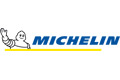Michelin-Logo mit winkendem Michelin-Männchen, blauer MICHELIN-Schrift und gelber Linie darunter.