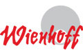 Roter kursiver Wienhoff-Text mit einem großen grauen Kreis im Hintergrund.
